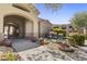 Elegant community entrance with manicured landscaping and water feature at 29606 N Tatum Blvd # 174, Cave Creek, AZ 85331
