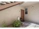 Inviting entryway featuring a decorated door, plants, and welcome decor at 29606 N Tatum Blvd # 174, Cave Creek, AZ 85331