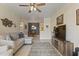Bright living room flowing into the dining area with comfortable seating at 29606 N Tatum Blvd # 174, Cave Creek, AZ 85331