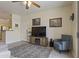 Comfortable living room next to the kitchen, and featuring a television at 29606 N Tatum Blvd # 174, Cave Creek, AZ 85331