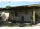 Covered patio with ample space for seating, perfect for outdoor relaxation and entertainment at 3001 W Shaw Butte Dr, Phoenix, AZ 85029