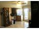 Eat-in kitchen area featuring a tile floor and direct access to the backyard through a glass door at 3001 W Shaw Butte Dr, Phoenix, AZ 85029
