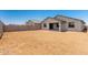 A charming home features a spacious backyard ready for landscaping and outdoor activities at 31619 N Shady Pasture Ln, San Tan Valley, AZ 85143