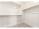 Spacious walk-in closet with ample shelving and storage space, perfect for organization at 31619 N Shady Pasture Ln, San Tan Valley, AZ 85143