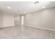 Spacious living area featuring tile flooring, neutral paint, and abundant natural light, perfect for entertaining at 31619 N Shady Pasture Ln, San Tan Valley, AZ 85143