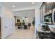 Bright open-concept dining area with modern furnishings, seamlessly connected to living spaces at 3335 S Lily Ave, Mesa, AZ 85212