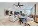 Inviting living room featuring a comfortable sofa, stylish decor, and ample natural light at 3335 S Lily Ave, Mesa, AZ 85212