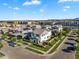 Wide aerial shot of a suburban neighborhood with well-maintained homes and green spaces in Arizona at 3415 E Arabian Dr, Gilbert, AZ 85296