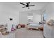 Well-lit bedroom with ample natural light, featuring toys and play area at 3415 E Arabian Dr, Gilbert, AZ 85296