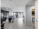 Open-concept living area showcasing a large island, kitchen, and ample space for gathering at 42180 W Cheyenne Dr, Maricopa, AZ 85138