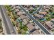 Aerial view of homes in a neighborhood featuring pools, landscaping, and tree-lined streets, offering a desirable residential setting at 4305 S Antonio --, Mesa, AZ 85212