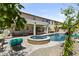 Private backyard features a covered patio, pool, spa, and lush landscaping at 4305 S Antonio --, Mesa, AZ 85212