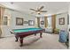 Bright game room featuring a pool table, ceiling fan, neutral carpet, and natural light at 4305 S Antonio --, Mesa, AZ 85212