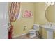Charming half bathroom with yellow walls, and decorative accents at 4305 S Antonio --, Mesa, AZ 85212