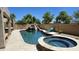 A beautiful pool and spa combo with a rock waterfall and slide; the ultimate backyard paradise at 4305 S Antonio --, Mesa, AZ 85212
