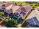 A lovely aerial view of home that includes a backyard pool, patio and manicured lawn at 4337 S Helix --, Mesa, AZ 85212