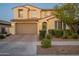 Charming two-story home featuring a brick driveway, a 2-car garage, and well-manicured landscaping at 4337 S Helix --, Mesa, AZ 85212
