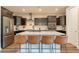 Beautiful kitchen featuring an island with seating, modern stainless appliances, and plenty of cabinet space at 4337 S Helix --, Mesa, AZ 85212