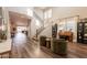 Bright, open living room featuring hardwood floors and a soaring two-story ceiling at 4337 S Helix --, Mesa, AZ 85212