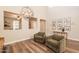 Inviting living room with hardwood floors, comfortable seating, and abundant natural light at 4337 S Helix --, Mesa, AZ 85212