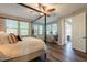 Spacious main bedroom showcases a dedicated desk area and multiple windows for abundant natural light at 4337 S Helix --, Mesa, AZ 85212