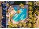 Aerial view of a resort style pool with palm trees, lounge chairs and cabanas at 4337 S Helix --, Mesa, AZ 85212