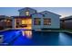 A stunning backyard pool with custom lighting, patio, and artificial grass at 4337 S Helix --, Mesa, AZ 85212
