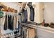 Organized walk-in closet with clothing racks and shoe shelves for ample storage at 4337 S Helix --, Mesa, AZ 85212