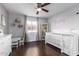 Charming bedroom with hardwood floors, bright natural light, and plenty of space at 4554 E Paradise Village Pkwy # 267, Phoenix, AZ 85032