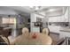 Open floor plan featuring a bright dining area that connects to the living room and kitchen at 4554 E Paradise Village Pkwy # 267, Phoenix, AZ 85032