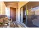Comfortable patio with privacy screen and comfortable seating to enjoy the view at 4554 E Paradise Village Pkwy # 267, Phoenix, AZ 85032