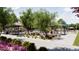 Enjoyable community playground showcasing playground equipment, covered seating, and attractive landscaping at 4588 S 232Nd Dr, Buckeye, AZ 85326