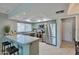 Modern kitchen featuring stainless steel appliances, a breakfast bar, and neutral cabinets with plenty of counter space at 4815 E Everett Dr, Scottsdale, AZ 85254