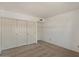 Neutral bedroom featuring a spacious closet and plush carpet at 509 W Boxelder Pl, Chandler, AZ 85225