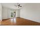 Spacious bedroom features new flooring, French doors, and access to the backyard at 509 W Boxelder Pl, Chandler, AZ 85225
