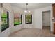 Bright breakfast nook with tile floors and views of the landscaped backyard at 509 W Boxelder Pl, Chandler, AZ 85225