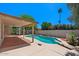 Sparkling swimming pool with covered patio and landscaped backyard at 509 W Boxelder Pl, Chandler, AZ 85225