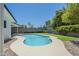 Beautiful backyard featuring a sparkling pool and mature trees at 520 N 23Rd St, Mesa, AZ 85213