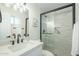 Beautiful bathroom featuring matte black hardware, quartz counters, and a glass shower at 520 N 23Rd St, Mesa, AZ 85213