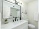 Beautiful bathroom featuring matte black hardware, quartz counters, and modern decor at 520 N 23Rd St, Mesa, AZ 85213