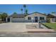 Charming single-story home with desert landscaping, a spacious driveway, and a welcoming entrance at 520 N 23Rd St, Mesa, AZ 85213