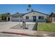 Charming single-story home with desert landscaping, a spacious driveway, and a welcoming entrance at 520 N 23Rd St, Mesa, AZ 85213