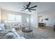 Bright living room with neutral tones, modern furnishings, and abundant natural light at 520 N 23Rd St, Mesa, AZ 85213