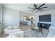 Spacious living room, open to the kitchen, with modern furnishings and lots of natural light at 520 N 23Rd St, Mesa, AZ 85213