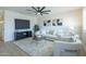 Bright living room with neutral tones, modern furnishings, and abundant natural light at 520 N 23Rd St, Mesa, AZ 85213