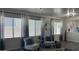 Cozy sitting area filled with natural light showcases modern decor and comfortable seating at 6421 S 23Rd Dr, Phoenix, AZ 85041