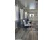 Open living area with hardwood floors, modern decor and inviting furnishings provides a relaxed atmosphere at 6421 S 23Rd Dr, Phoenix, AZ 85041
