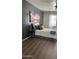 Comfortable bedroom featuring soft lighting, a decorative painting, and a cozy bed at 6421 S 23Rd Dr, Phoenix, AZ 85041