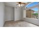 Bedroom featuring tile flooring, a vaulted window and ceiling fan at 6672 E Horned Owl Trl, Scottsdale, AZ 85266