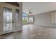 Elegant foyer with tile flooring, arched windows, and an inviting front door at 6672 E Horned Owl Trl, Scottsdale, AZ 85266